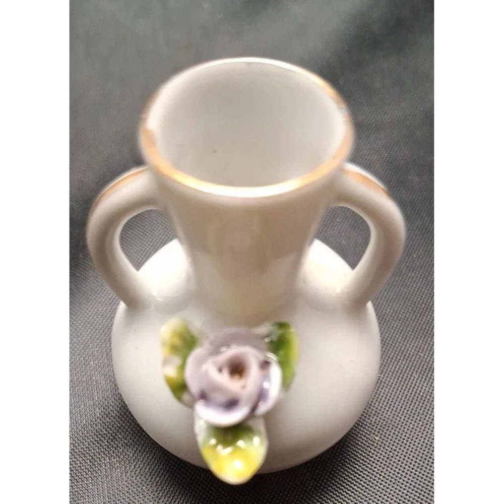 Collection of Seven Vintage Miniature Ceramic Bud Vases with Hand-Painted Design